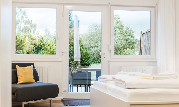 Scheidegg Apartment | Heimatel family studio including pool and sauna with a large terrace