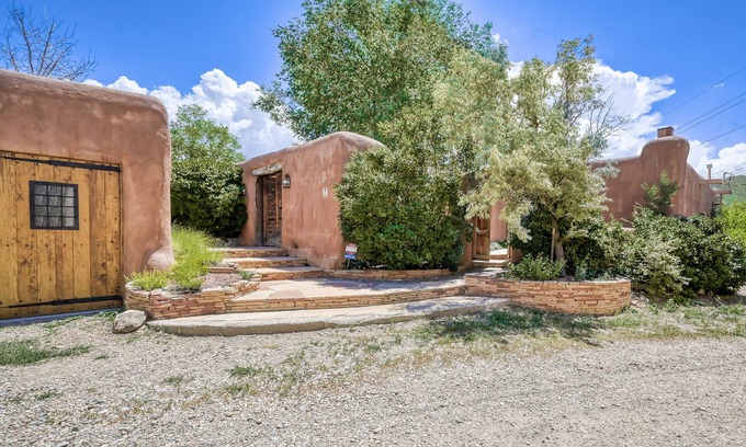 Taos House | Historic dog-friendly hacienda with 2 casitas, fireplaces, on-site hot tub, yoga