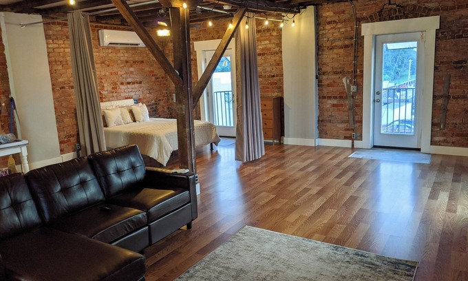 Livingston Apartment | Historic Loft with balconies.