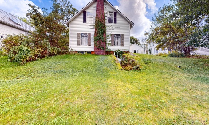Montpelier House | Historic, two-story 1860s home with a large yard, washer, & fireplace