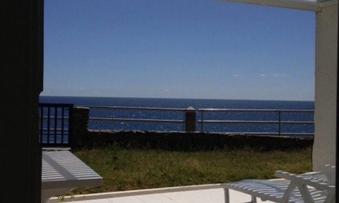 Playa del Aguila House | Holiday Home "Nueva Baviera 42" by the Sea with Garden & Shared Pool