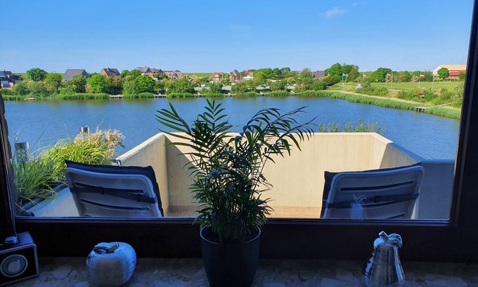 Norderhafen Apartment | Holiday Apartment 'Watt'n Utsicht' with Sea View, Balcony and Wi-Fi