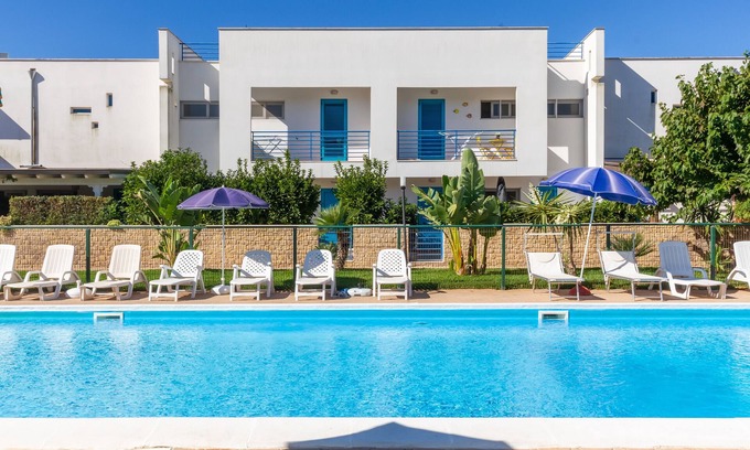 Boncore House | Holiday Home 'Libeccio Luxury Torre Lapillo' with Sea View, Shared Pool and Wi-Fi