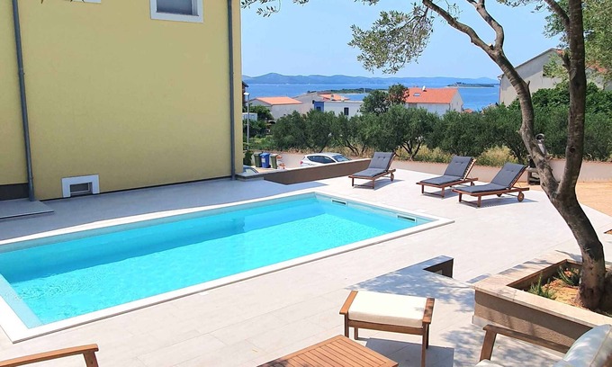 Drage House | Holiday home with air conditioning and sea view