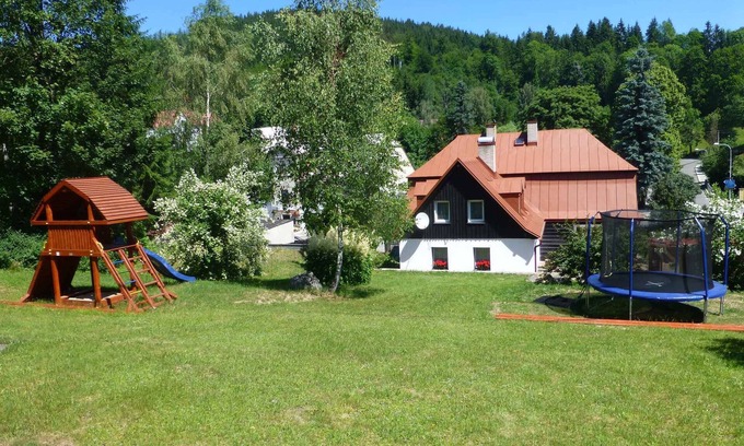 Josefov Dul House | Holiday home with wood-burning fireplace situated on a slope
