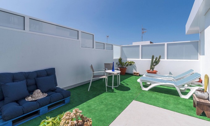 Vecindario Apartment | Home2Book Quiet Retreat with Patio & Roof Access