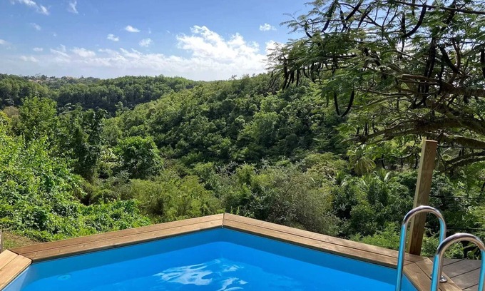 Le Gosier Ski Chalet | Homerez - Charming Chalet in Le Gosier with Private Pool