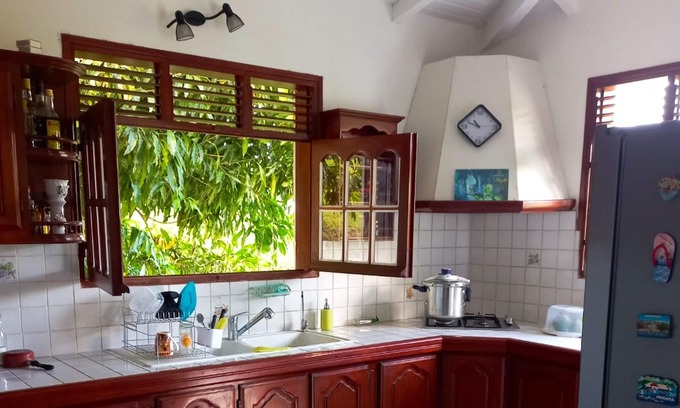 Saint-Claude House | Homerez - House 5 km away from the beach for 6 ppl. with terrace at Saint-Claude