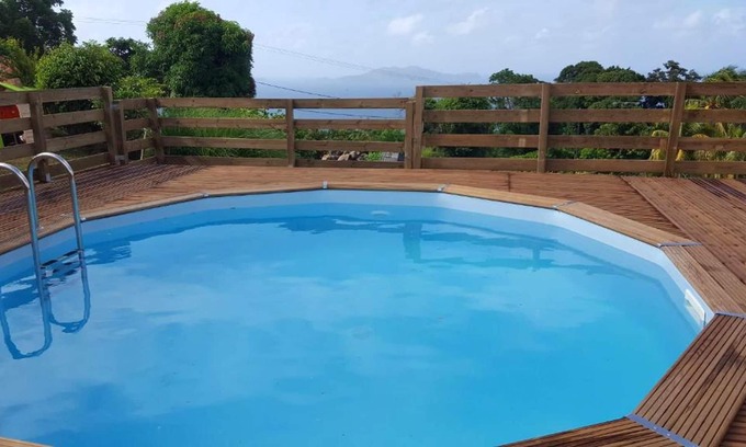 Trois-Rivieres House | Homerez - Nice house for 5 ppl. with shared pool and sea view at Trois-Rivières