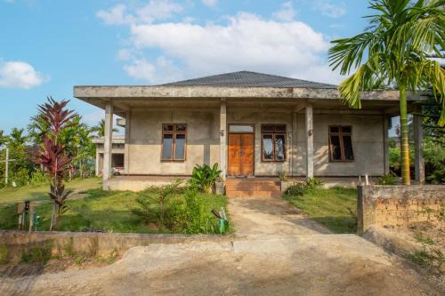 Jambi Hotel | Hotel O Homestay Romauli Kampung Radja