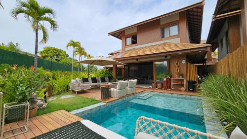 Itacimirim House | House in the Marluá condo in front of the beach