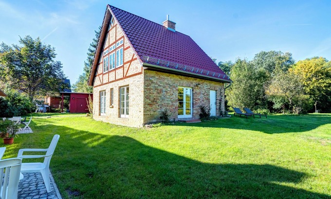 Lassan House | House in the middle of the garden by the swan pond
