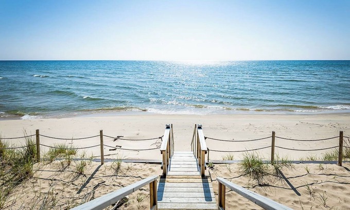 Montague Cottage | Huckleberry Hideaway: A Lake Michigan Sunset Retreat. Pet friendly!