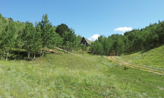 Cripple Creek House | Imagine a romantic couple’s cabin nestled in the heart of the Colorado Rockies
