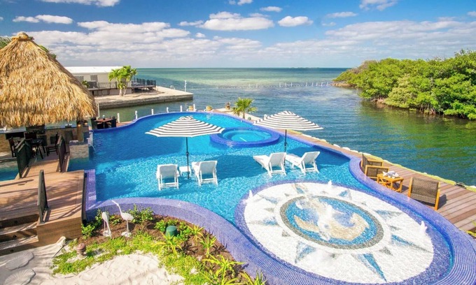 Marathon House | Isabella on Paradise Place 2 bed 2 bath with Exotic Magnificent pool and Open water views 200 ft of dockage