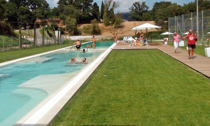 Castelnuovo di Val di Cecina Apartment | Cosy apartment for 8 people with WIFI, pool, TV, patio and pets allowed