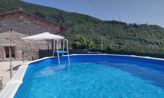 Villa Collemandina House | Cottage in medieval village, private pool, walk to restaurants