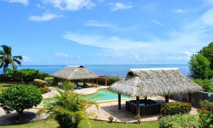 Paea Condo | Kahaia beach home with pool, amazing seafront black sand beach and reef