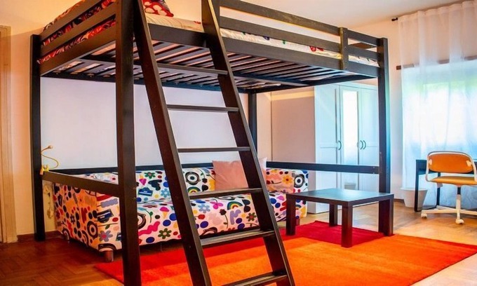 Quartiere XVII Trieste Apartment | KAMCHŪ APARTMENTS VILLA CHIGI: PRIVATE DOUBLE BEDROOM, LOUNGE AREA with SOFA #L2