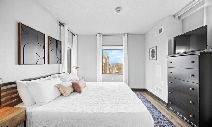 Historic East Village Apartment | King Bed | Onsite Gym | Downtown Views | Parking
