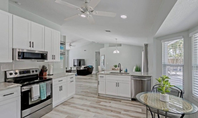 Royal Palm Beach House | King Beds ~ Private Heated Pool ~ Grill ~ Patio