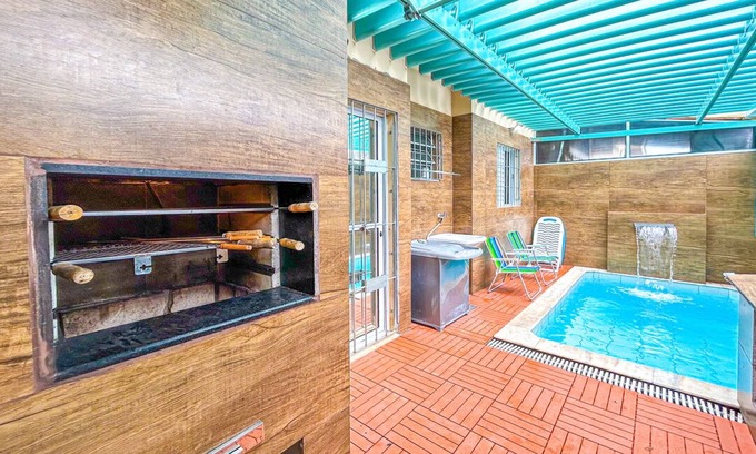 Cibratel II Apartment | Kitnet com WiFi, piscina e churrasq em Itanhaém/SP