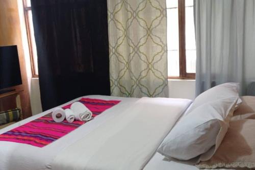 Cusco Historic Center Apartment | Kusi Uyacha Casa hospedaje Habitación 2-A cama matrimonial con baño compartido