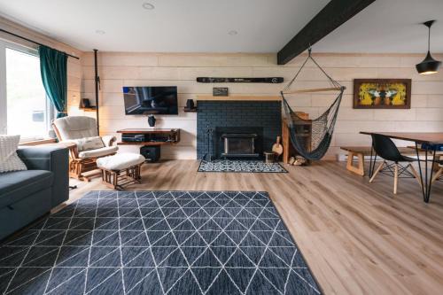 Murdochville Ski Chalet | La Murdoch Beach - Foyer et sauna