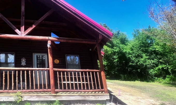 Checotah Cabin | Lake Eufaula Log Cabin with Hot Tub + WiFi
