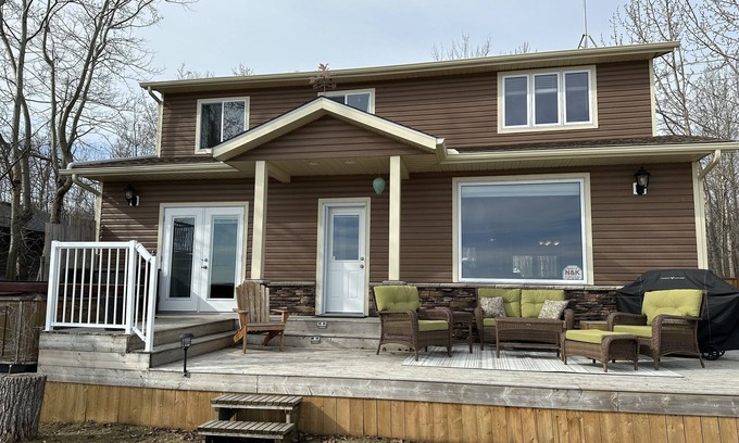 Westerose Cabin | Lake front cabin w/hot tub & firepit, close to The Village at Pigeon Lake.