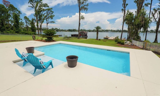 Lake Park House | Lake House Pool Home With Dock and Boat Ramp