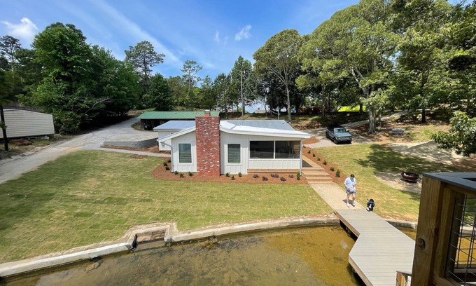 Dadeville Cabin | Lake Martin Family Compound - Sleeps 16 with Hot Tub and Private Lake Access!
