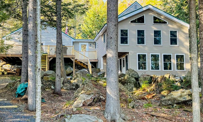 Beaver Cove House | Lakefront cabin close to town with dock, firepit - dogs welcome