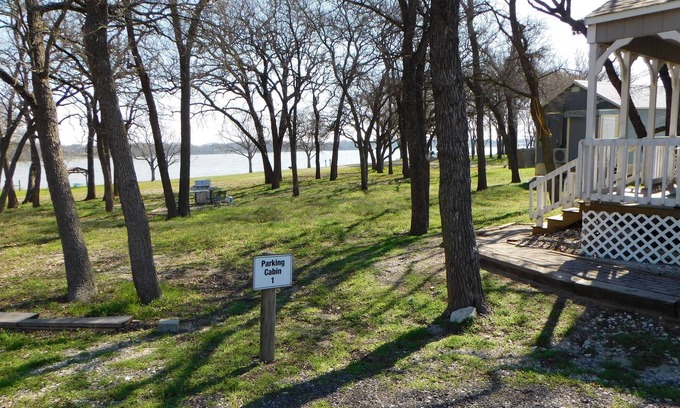 Little Elm Cabin | Lakefront Cabin! Ski, boat, fish, swim! 14+ acres! Perfect for a quick get-away!