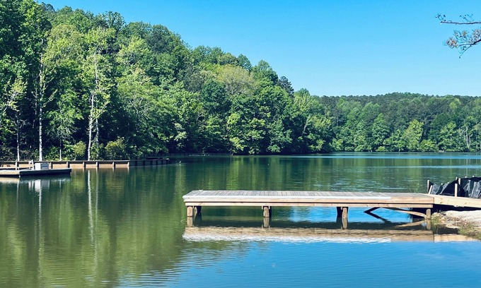 Dadeville House | Lakefront home. Beach. Kayaks. Dock. Outdoor fireplace & TV. Neighborhood Pool.