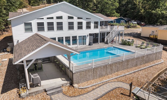 Sunrise Beach House | Lakefront Home Salt Water Pool & Private Dock