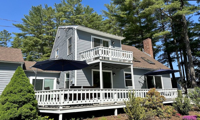 Alton Bay House | Lakefront home with deck, game room, washer/dryer, grill, dock, & views