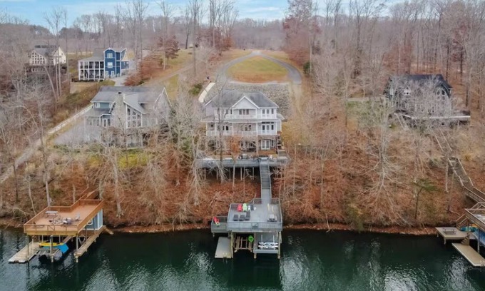 Moneta House | Lakefront Home with Hot tub, dock, & 12 beds