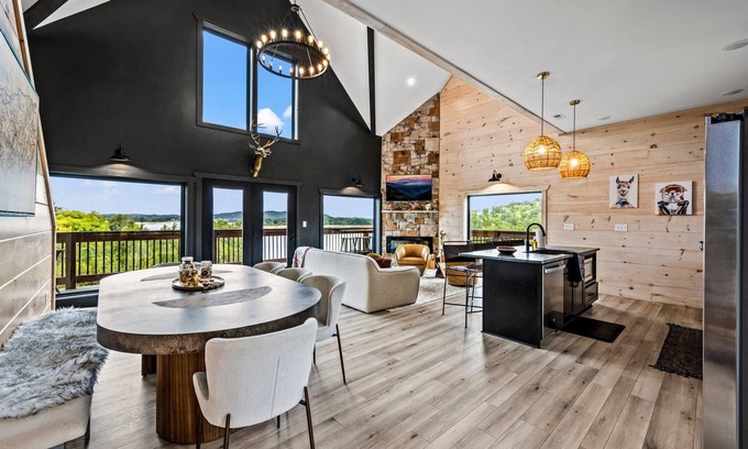 Sevierville Cabin | Lakefront home with retro accents, private pool, and private dock.