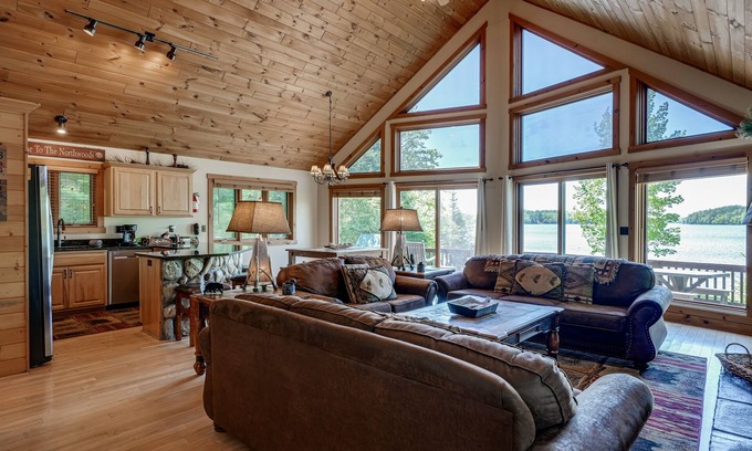 Eagle River House | Lakefront lodge with private dock, firepit, deck & sunset views