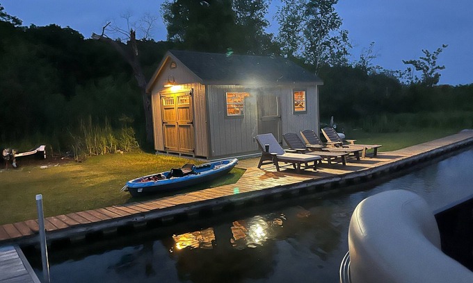 Mecosta Cottage | Lakefront Retreat | Hot Tub, Firepit, Kayaks, Dock & Spacious Outdoor Living