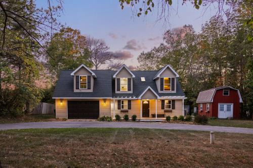 Charlevoix House | Lakefront Retreat, Mins to Dtown, Firepit, Hot Tub, Pet friendly!