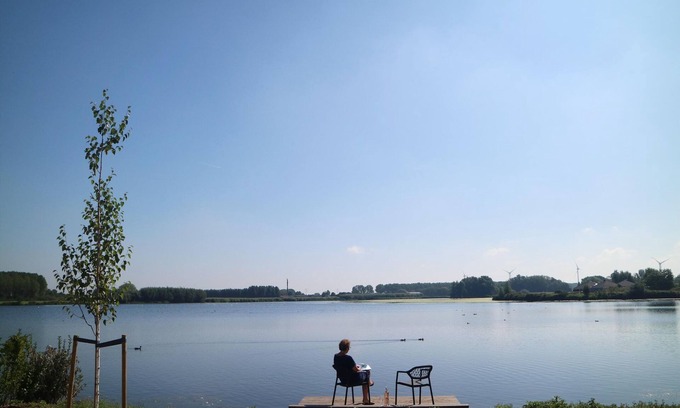 Municipality of Nissewaard House | Lakeview villa with swimming and fishing pier