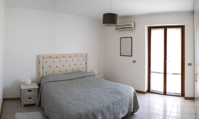 Capo Mulini Apartment | Large and elegant two-bedroom apartment in residence with pool