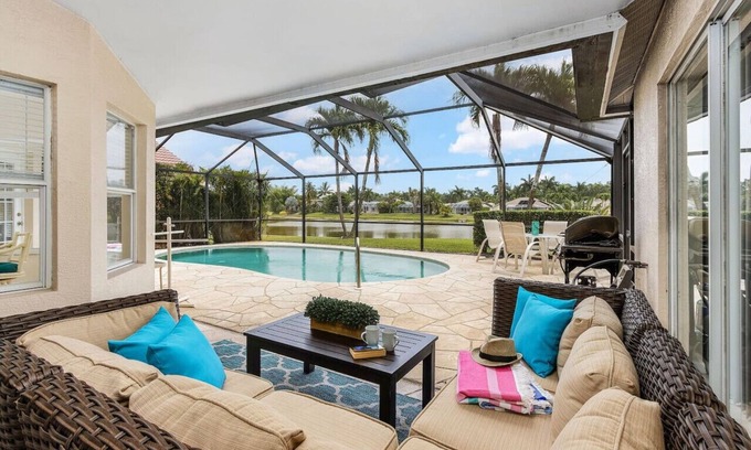 Central Naples House | Lazy days & lake views. Beautiful Naples pool home in Briarwood