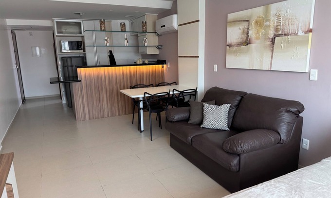 Praia Grande Apartment | Loft with sea view.