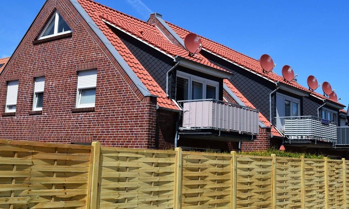 Norddeich Apartment | Lovely apartment for 4 guests with WIFI, TV, terrace and parking
