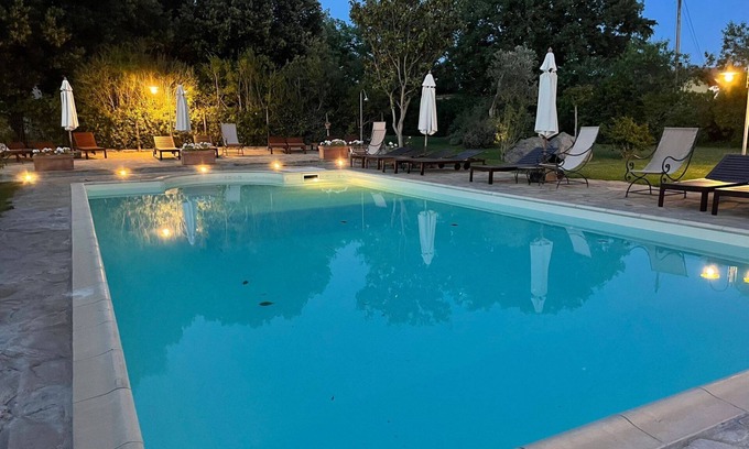 Cinigiano Apartment | Lovely apartment for 4 people with pool, A/C, TV, terrace, pets allowed and parking