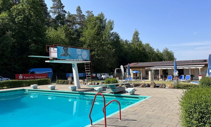 Bad Emstal House | Lovely apartment in villa for 3 guests with WIFI, pool, TV, terrace and pets allowed