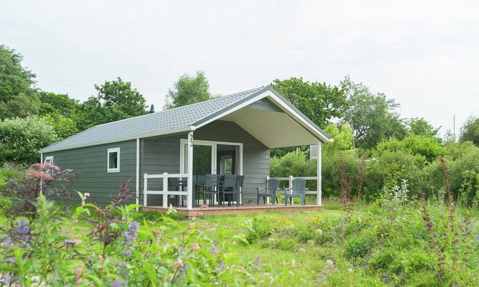 Sint Maartensvlotbrug Ski Chalet | Lovely chalet with terrace near the North Sea